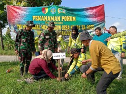 Satgas TMMD 124 Kodim Nganjuk Bersama Msyarakat Dan Instansi Terkait Adakan Penghijauan.