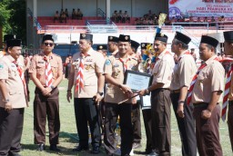 Dandim Nganjuk Hadiri Apel Besar Peringatan Hari Pramuka ke-64 di Stadion Anjuk Ladang