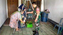 Wujudkan Balita Sehat, Babinsa Koramil 0810/03 Loceret Dampingi Kegiatan Posyandu di Desa Nglaban