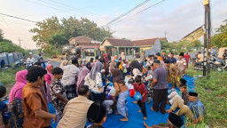 Sambut 1 Suro, Ratusan Warga Bendo Gelar Tradisi Baritan di Tengah Jalan