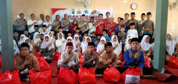 Sambut HUT Bhayangkara ke-80, Kapolres Nganjuk dan PSMTI Ketuk Pintu Panti Asuhan, Bagikan Baju Baru hingga Sembako