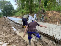 Hujan Turun Satgas TMMD Ke 124 Cekatan Menutup Jalan Cor