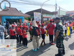 Babinsa Dan Bhabinkamtibmas Kompak Amankan Jalan Sehat Dalam Rangka Memperingati Hut Koprasi Nasional Ke 78 Tahun 2025
